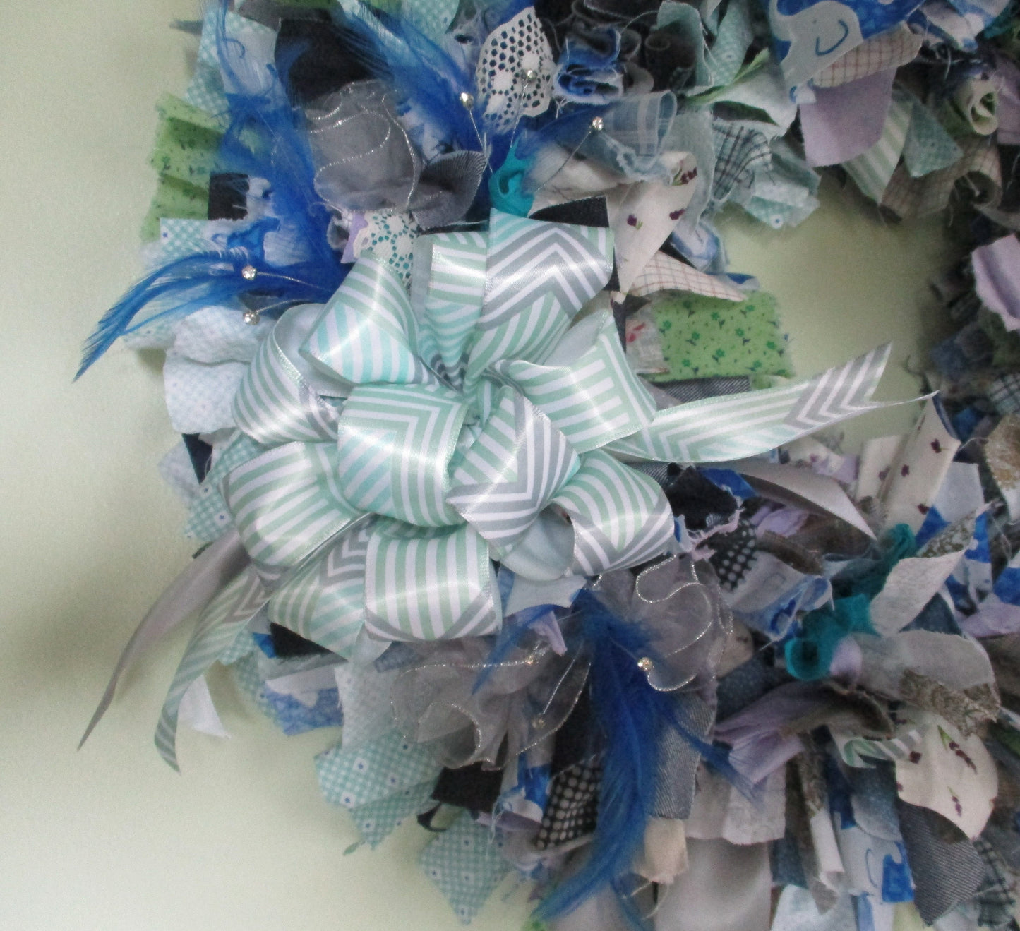 Blue Grey Purple and Pastel Green Rag Wreath with Blue Feathers and Rhinestone Accents