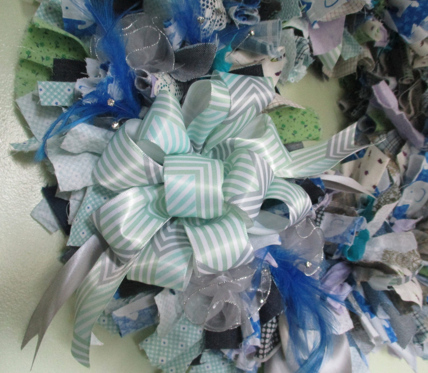 Blue Grey  Purple and Pastel Green Rag Wreath with Blue Feathers and Rhinestone Accents