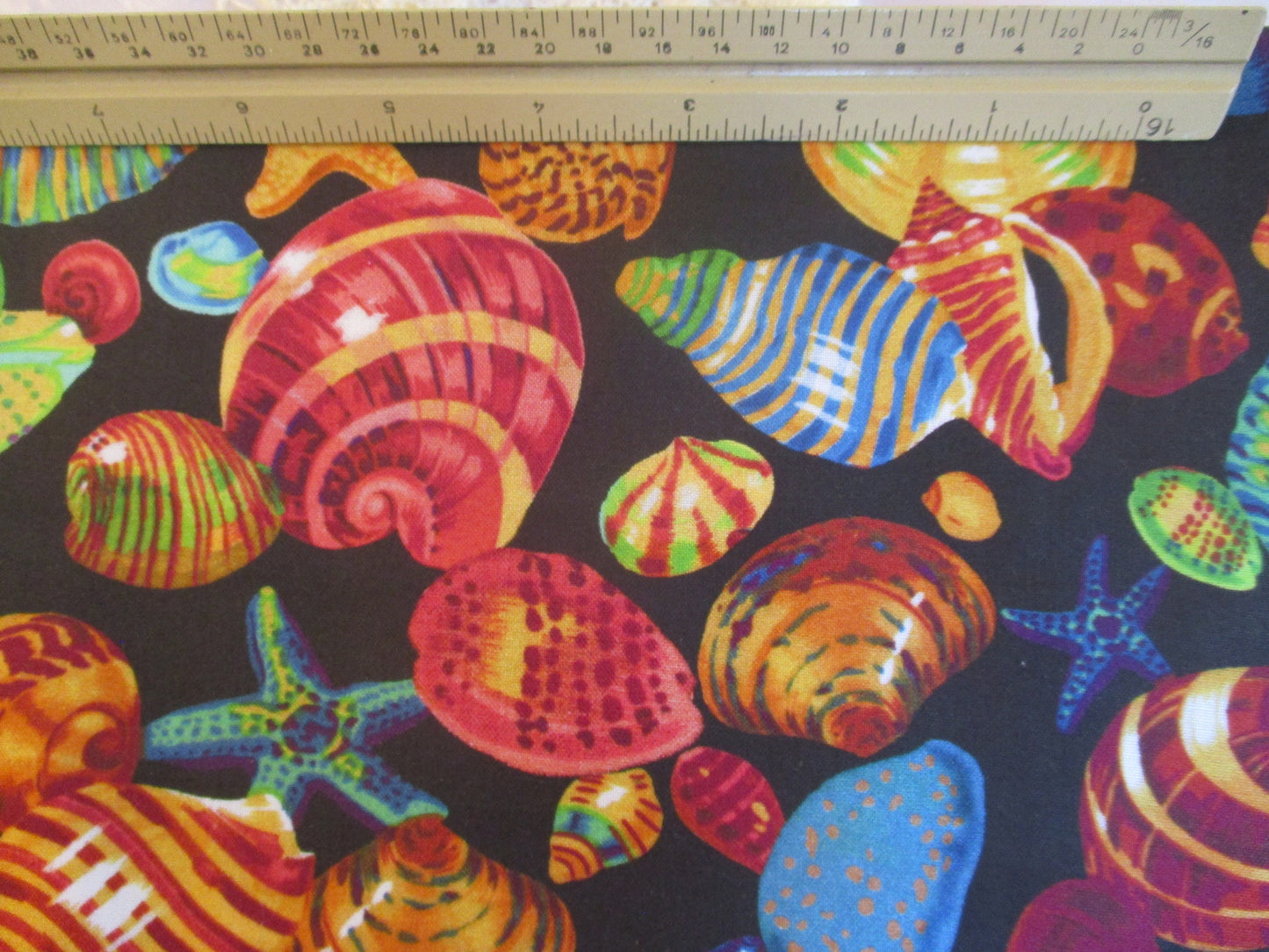 Colorful Seashells on black Beach Theme Shell Sea 100% Cotton Quilting Fabric By the Yard or Fat Quarter by Springs Creative